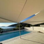 Sonnensegel elektrisch aufrollbar für den Pool