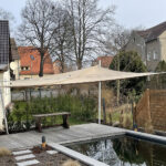 Sonnensegel manuell aufrollbar über Pool