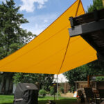 Sonnensegel-gelb-Garten